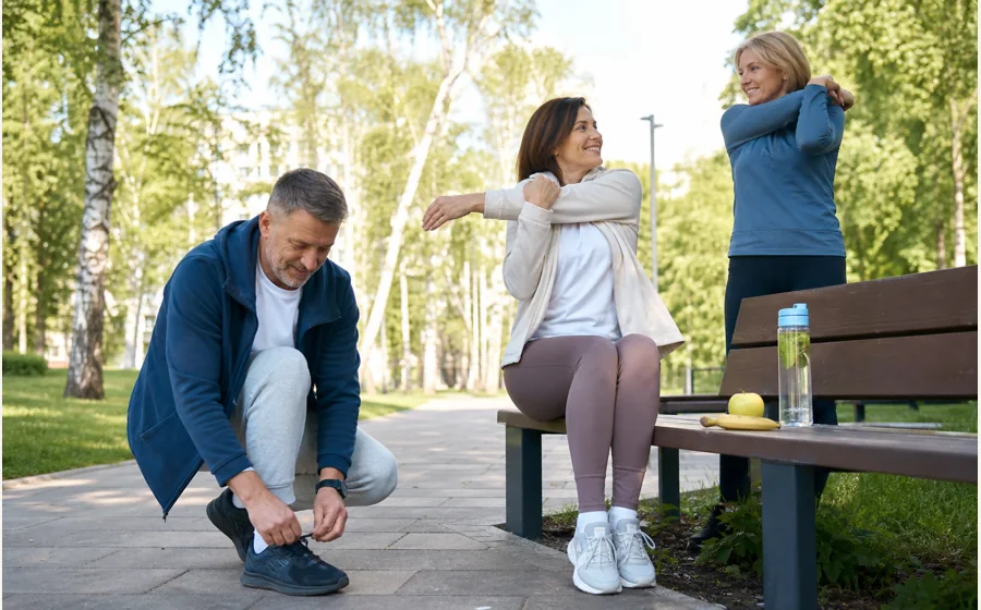 Adults of different ages preparing for a calm walk in a park
